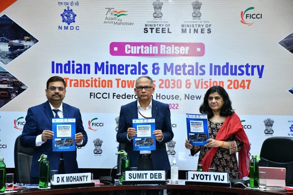 Mr. Sumit Deb Chair FICCI Mining Committee and CMD NMDC along with Ms. Jyoti Vij Deputy Secretary General FICCI launching a Background Report on Indian Minerals Metal Industry