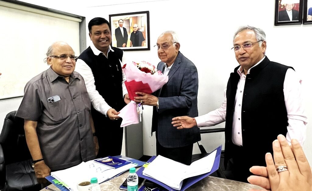 Mr Jagdish Capoor being welcomed by West End Housing Finance Board Members