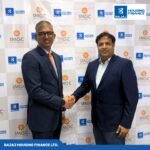 Mahesh Misra MD CEO IMGC and Pawan Bhansali Senior EVP – Bajaj Housing Finance at the partnership announcement to expand affordable housing finance